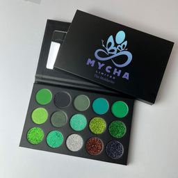 The Moldavite eyeshadow palette with vibrant green shades and shimmering finishes in a sleek black case