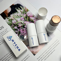 Radiant Aura Highlighter Stick with velvety luminous shimmer for glowing skin