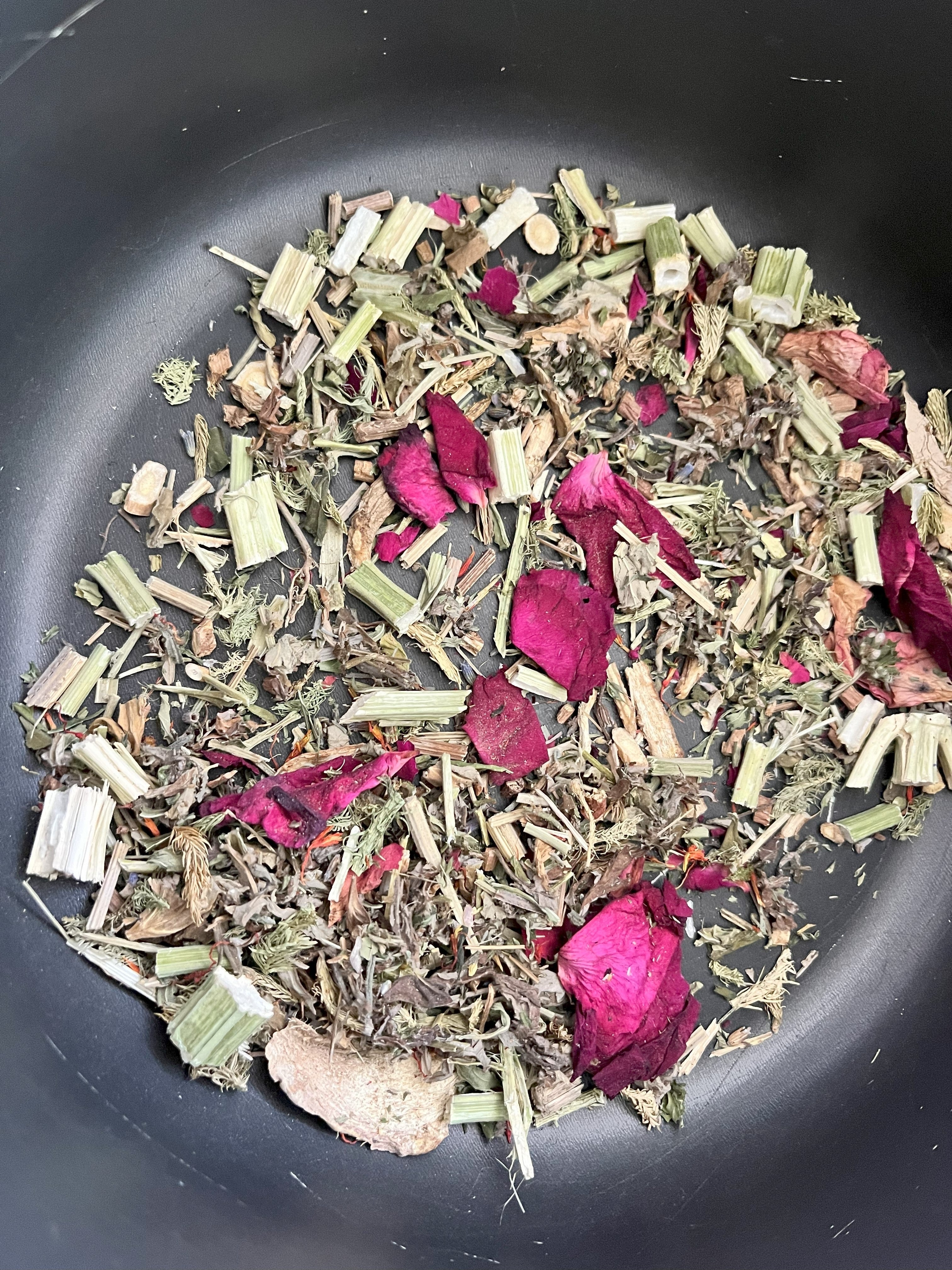 Divine Feminine Herbal Yoni Steam blend with dried herbs and rose petals for natural vaginal cleansing and soothing menstrual relief