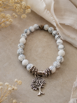 White Howlite Tree of Life Bracelet with marbled beads and silver charm on stretch elastic band