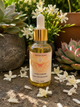 Divine Feminine Yoni Oil bottle with natural organic skin care ingredients for feminine wellness