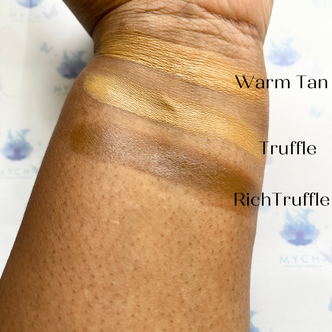 Swatches of Flawless Blend 2 in 1 foundation and concealer shades Warm Tan, Truffle, and Rich Truffle on medium skin tone for GlowUp CC Cream.