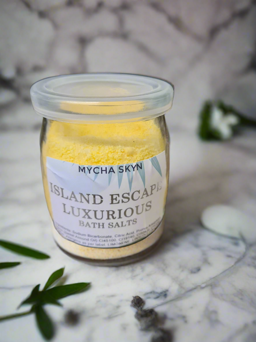 Island Escape Luxurious Foaming Bath Salts in glass jar with piña colada scent for relaxing soak
